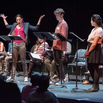 Students performing on stage at the New Play Festival 2018.