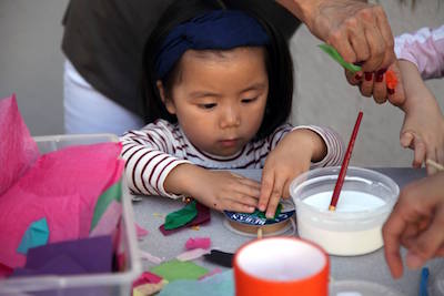 Child making arts and crafts