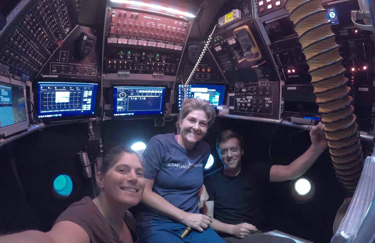 Shana Goffredi, Victoria Orphan and pilot Danik Forsman inside the Alvin submarine