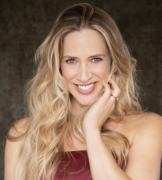 Karen Hogle Brown headshot in red dress