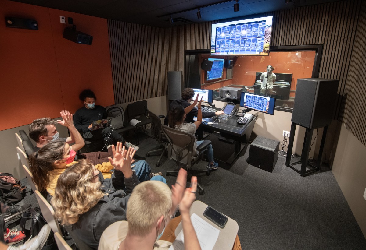 Max Foreman teaches a Recording Techniques class in the Choi Auditorium