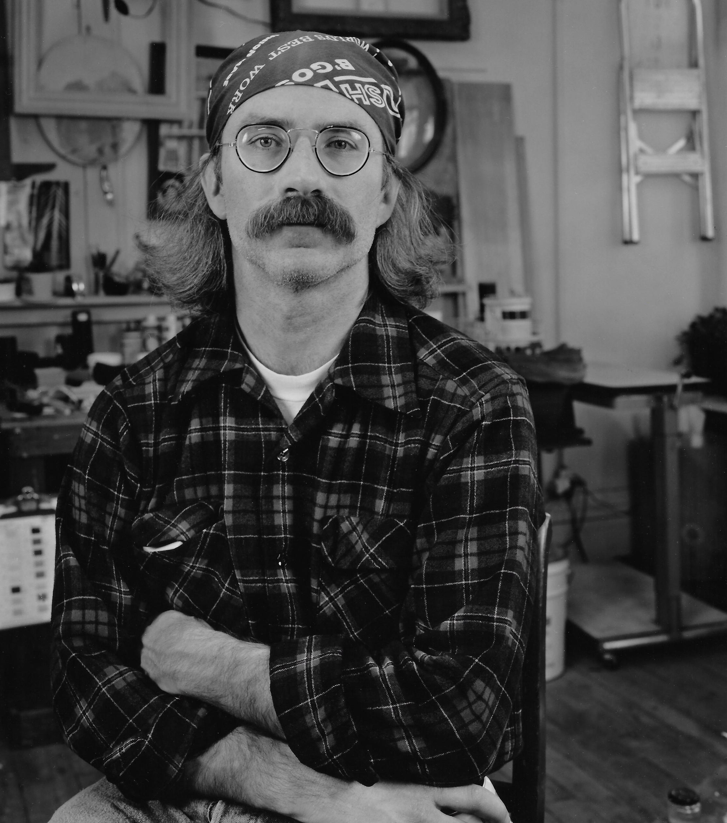 Jim Conlin '74 at home in his garage in Rochester, N.Y., in an undated photo.