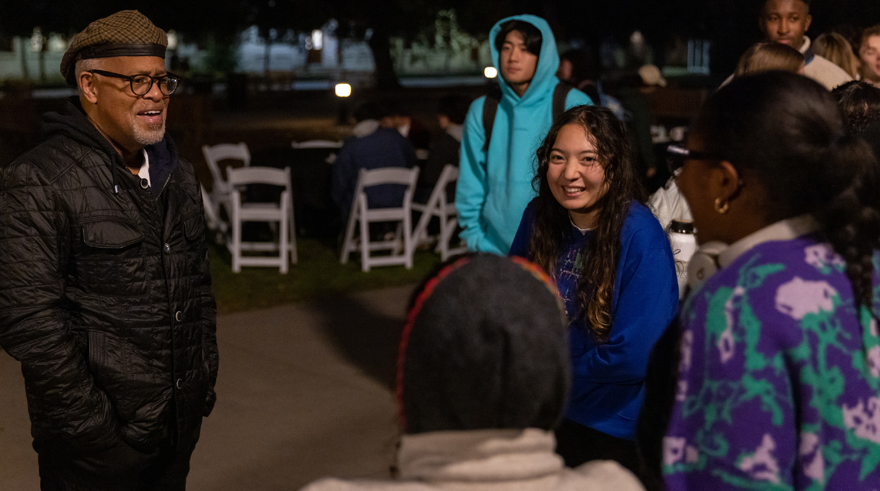 President Elam talks to students at Moonlight Breakfast on the Quad in December 2022.