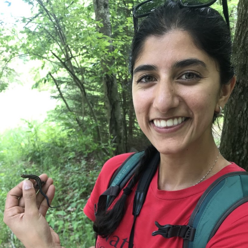 Neha Savant holding a lizard