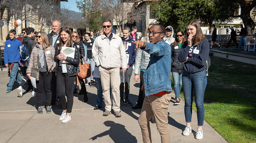 Jordan Walker leads a tour group