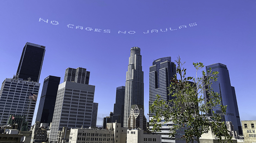 Sky writing from In Plain Sight activism