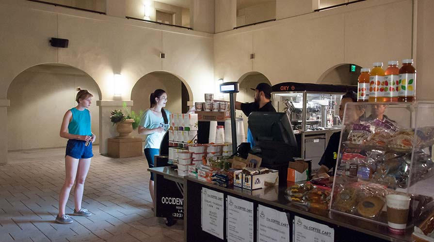 Students grab a late night snack at the Coffee Cart in Berkus Hall