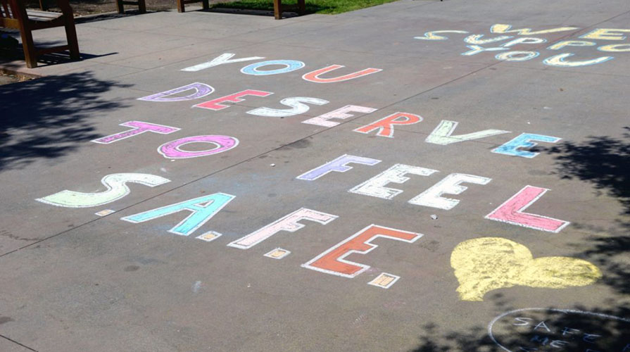 Chalk drawings by Project SAFE on campus
