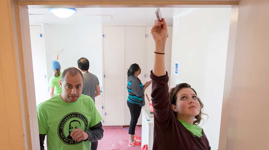 Students renovating a house as volunteer workers