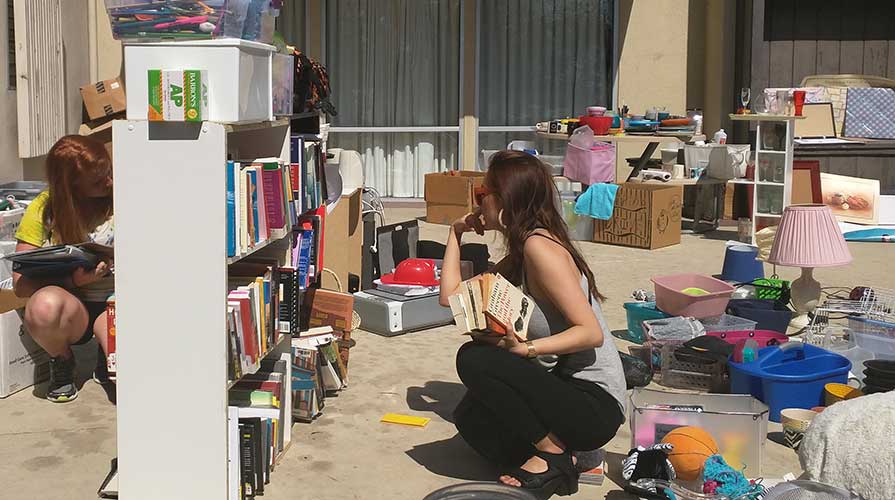 Students browsing the Sustainable ReCycle sale on campus