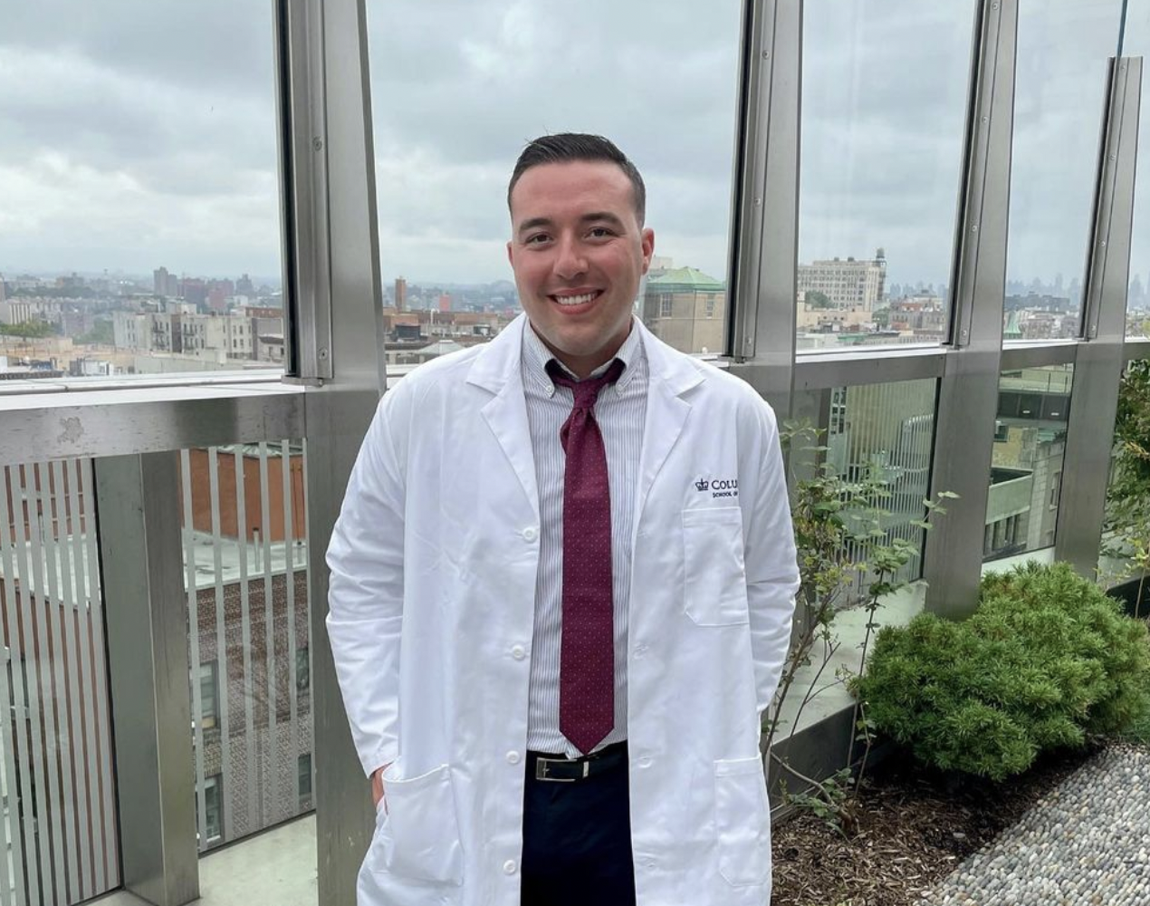 Pierce DiMauro in a white coat