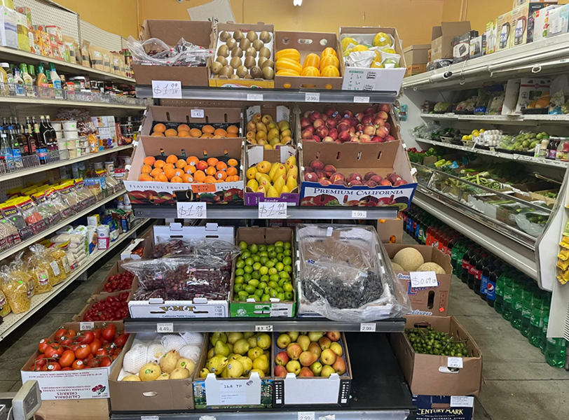 a grocery store with shelves of fresh produce