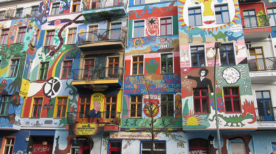 a colorfully painted mural on the wall of a building in Germany