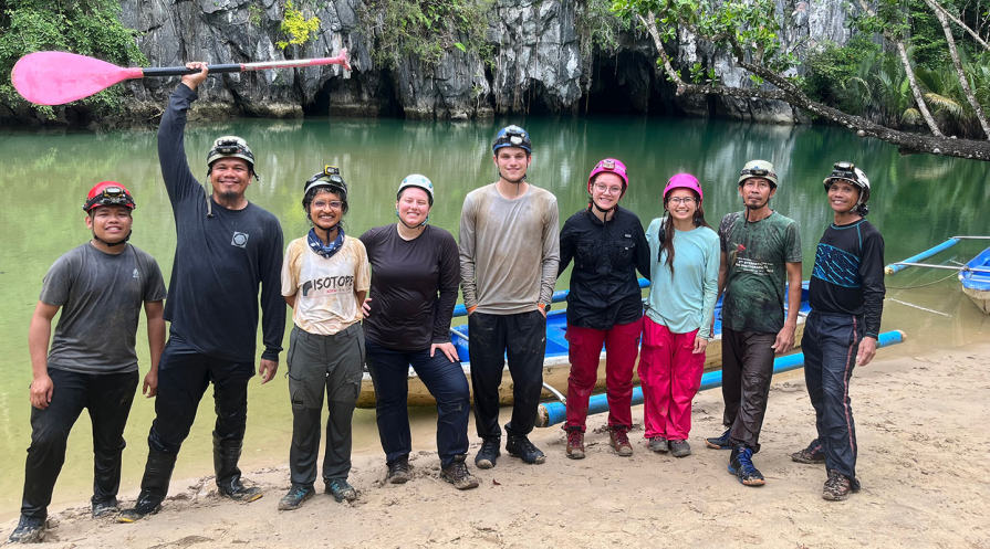 A group of geology researchers in the Philippines about to explore caves