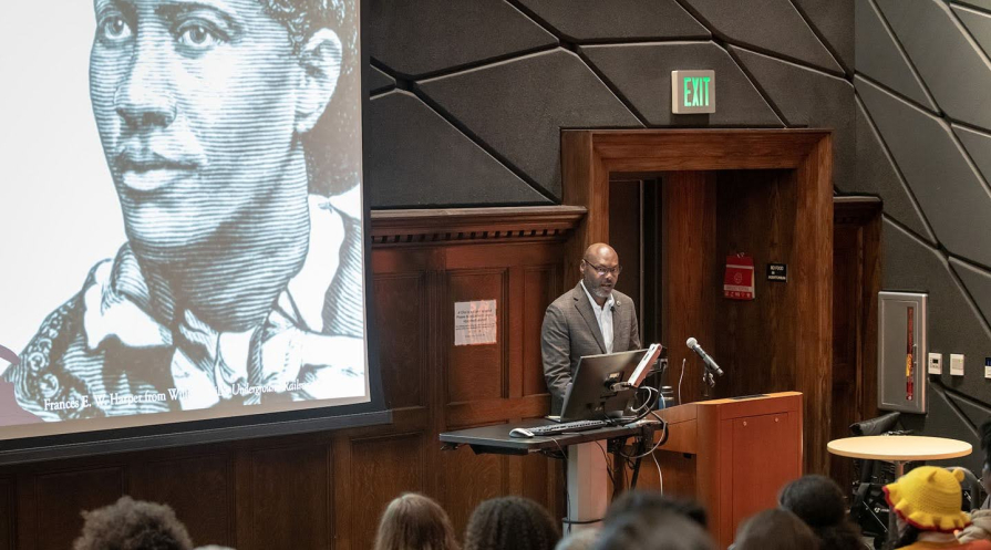 Dr. Derrick Spires giving the annual Stafford Ellison Wright lecture on campus in Choi Auditorium