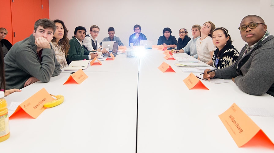 students sitting around a long table