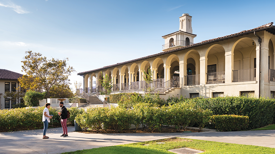 Students talk outside the Johnson Student Center on the Occidental College campus