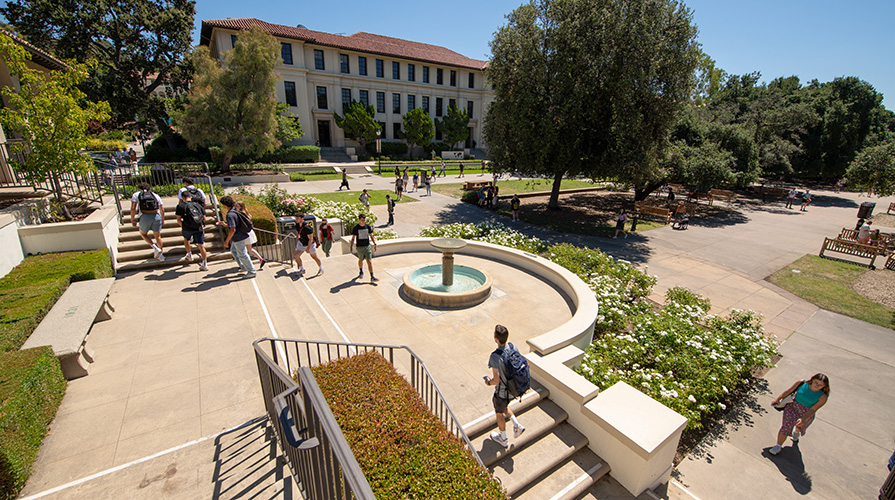 Students walk up the steps to the Johnson Student Center at Occidental College in Los Angeles