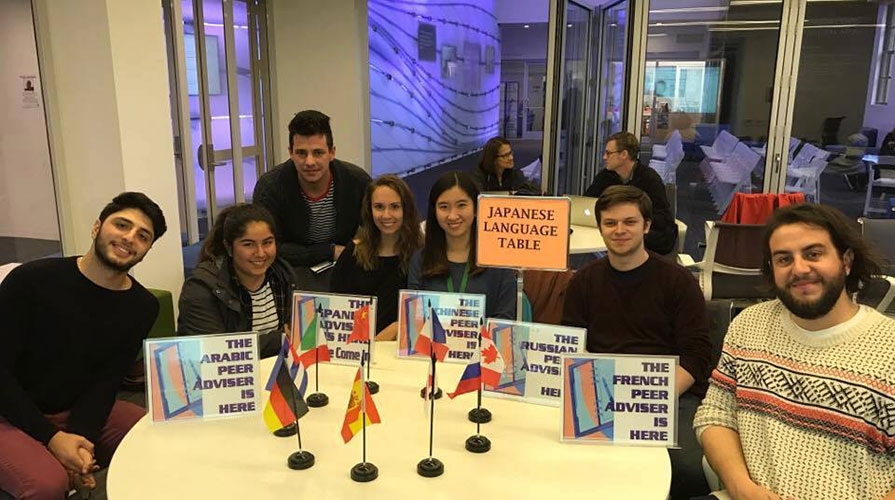 Students at language tables in the McKinnon Center for Global Affairs
