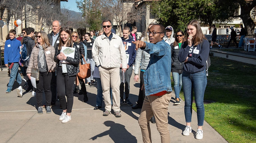 Jordan Walker leads a tour group