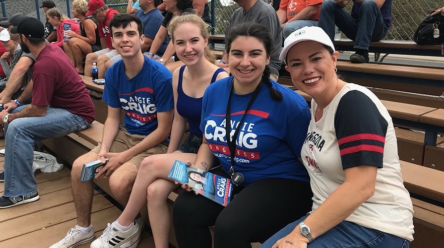 Students relaxing with their candidate at a sports game