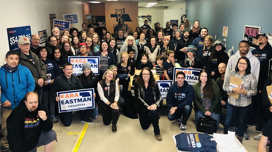 A campaign team poses together