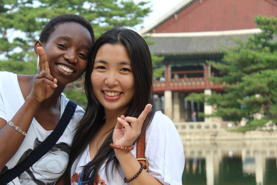 Diverse students pose together in Asia