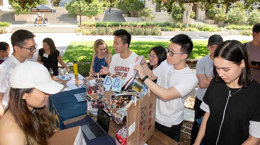 Oxy students at an involvement fair on campus