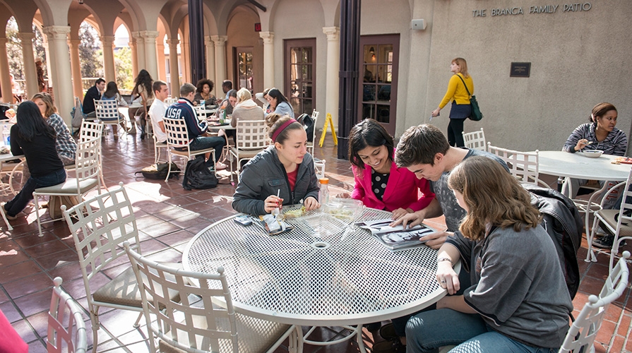 Students relaxing on Branca Patio