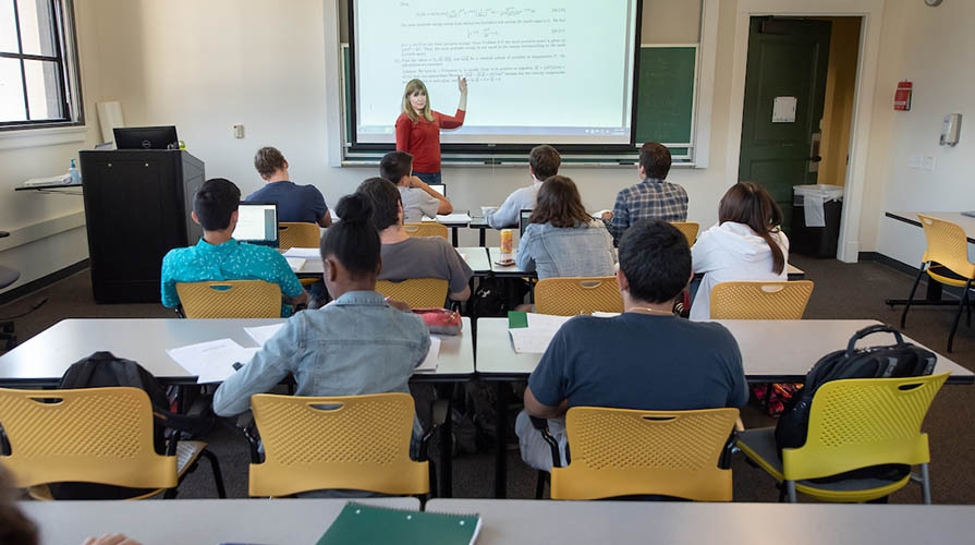 Professor Janet Scheel teaching a physics class