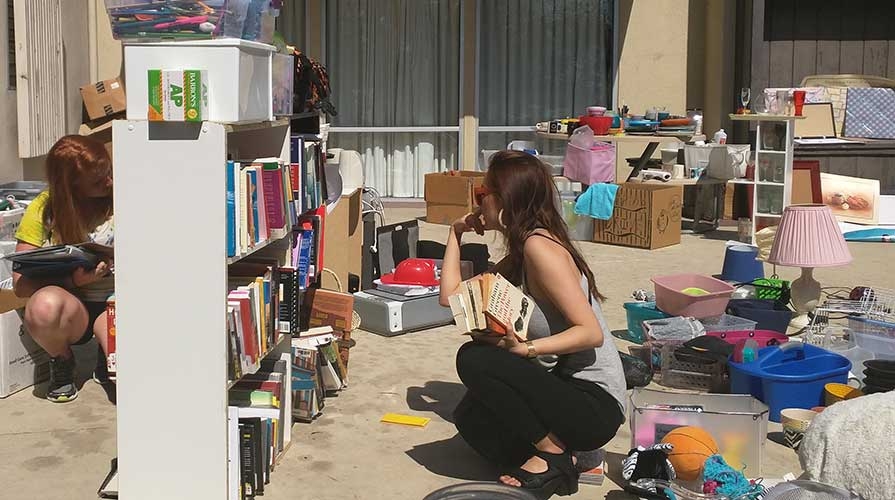 Students browsing the Sustainable ReCycle sale on campus