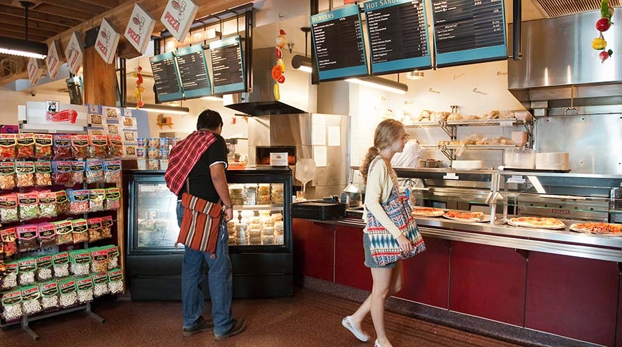 Students grab a snack at the Tiger Cooler