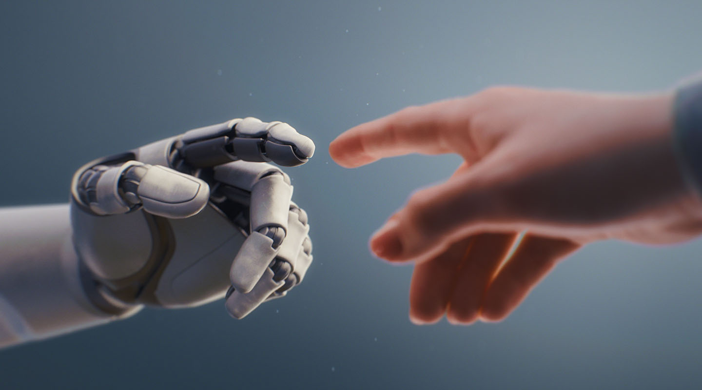 a robot hand reaching out to touch a human hand