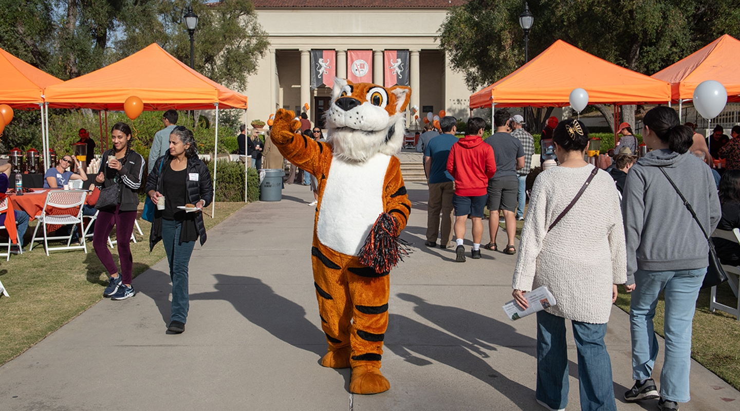 Oswald greets visitors to campus during Explore Occidental Fall Preview Day in November 2023.