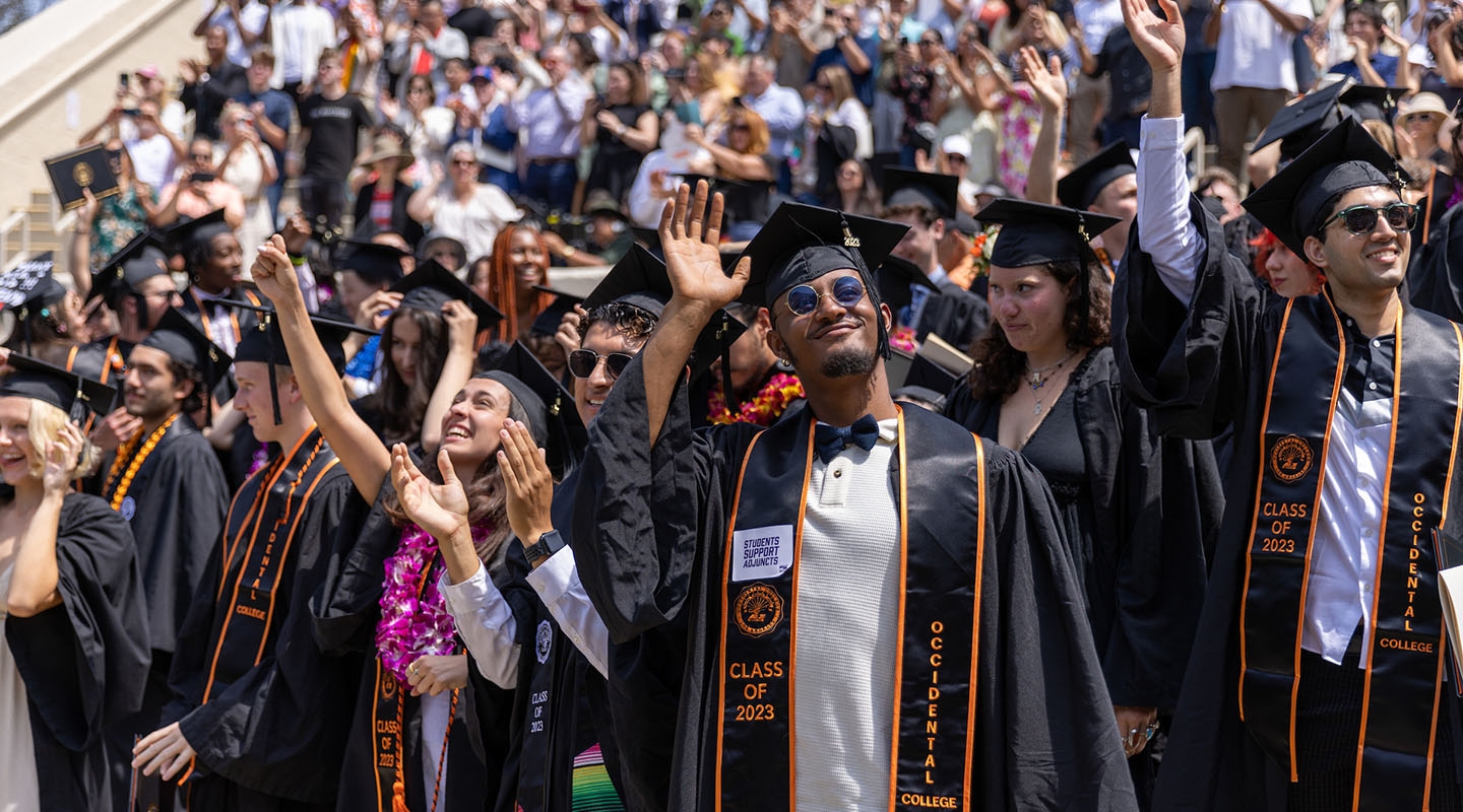 A scene on commencement day with a big crowd of happy graduates