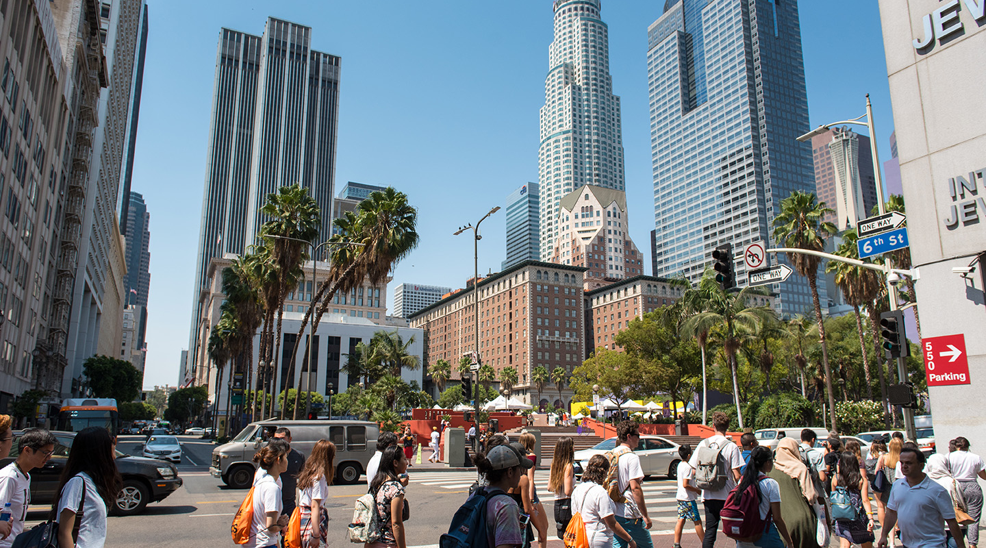 Occidental students walk through downtown Los Angeles on a class trip.