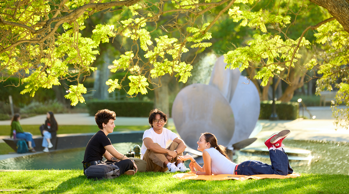 Occidental students relax near Lucille Gilman Fountain on an idyllic fall afternoon.