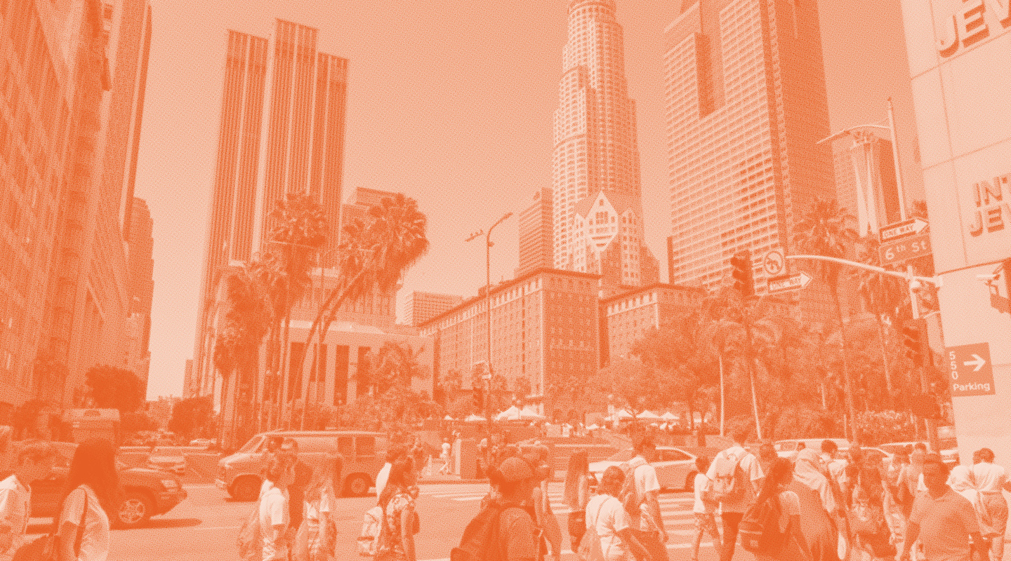 Occidental students walk through downtown Los Angeles on a class trip.