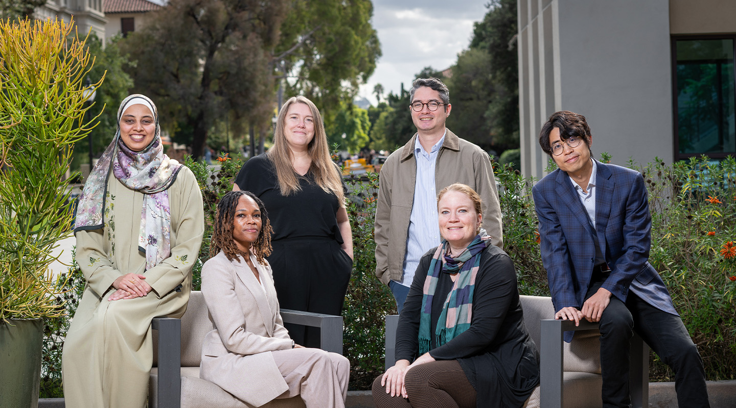 L-R: Associate professors Alaa Abdelfattah (economics), Tiffany Wheatland-Disu (Black studies), Madeline Wander ’08 (urban and environmental policy), Joel Walsh (computer science), Margaret Gaida (history), and Kai Yui Samuel Chan (politics).