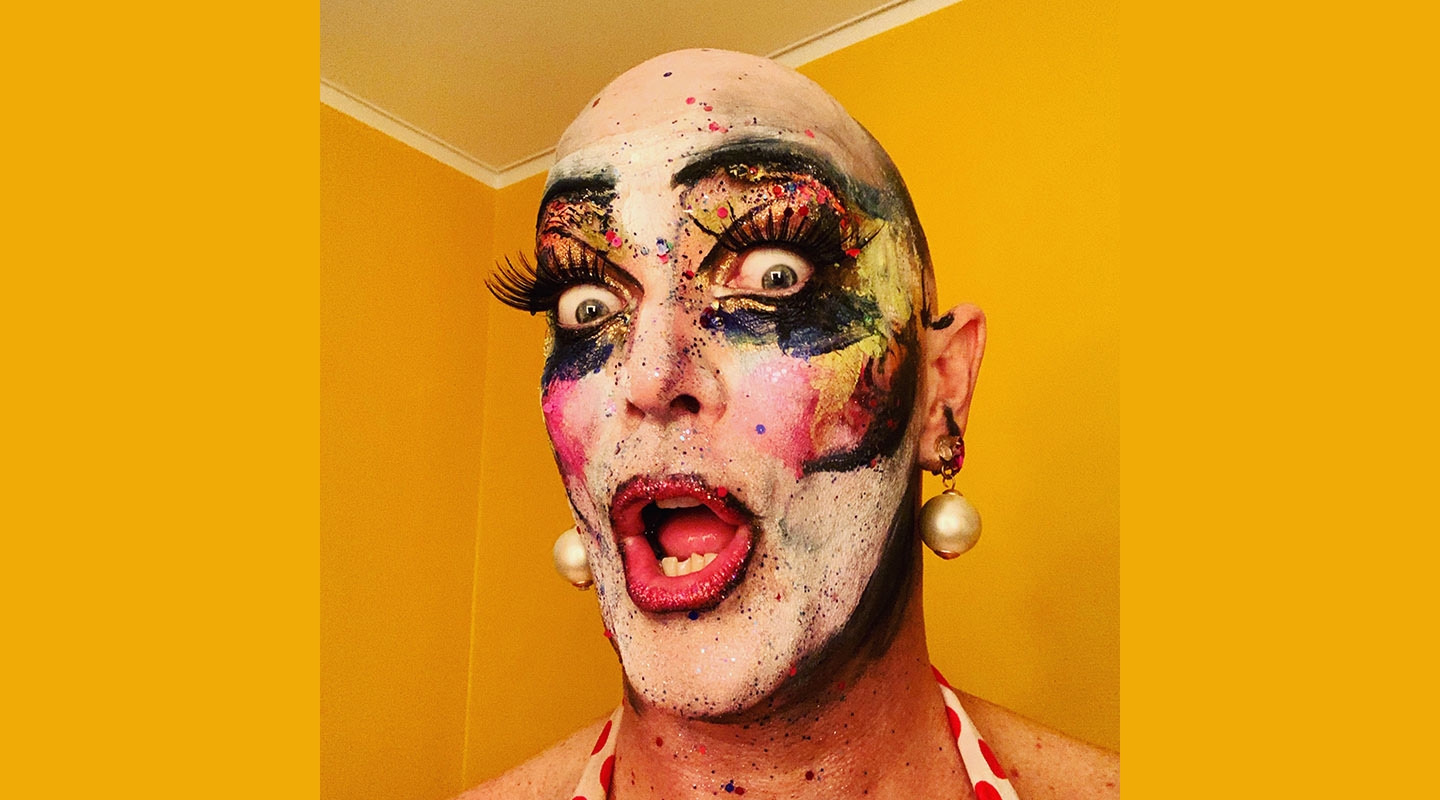 Drag performer Taylor Mac with huge false eyelashes and dramatic, glittery makeup