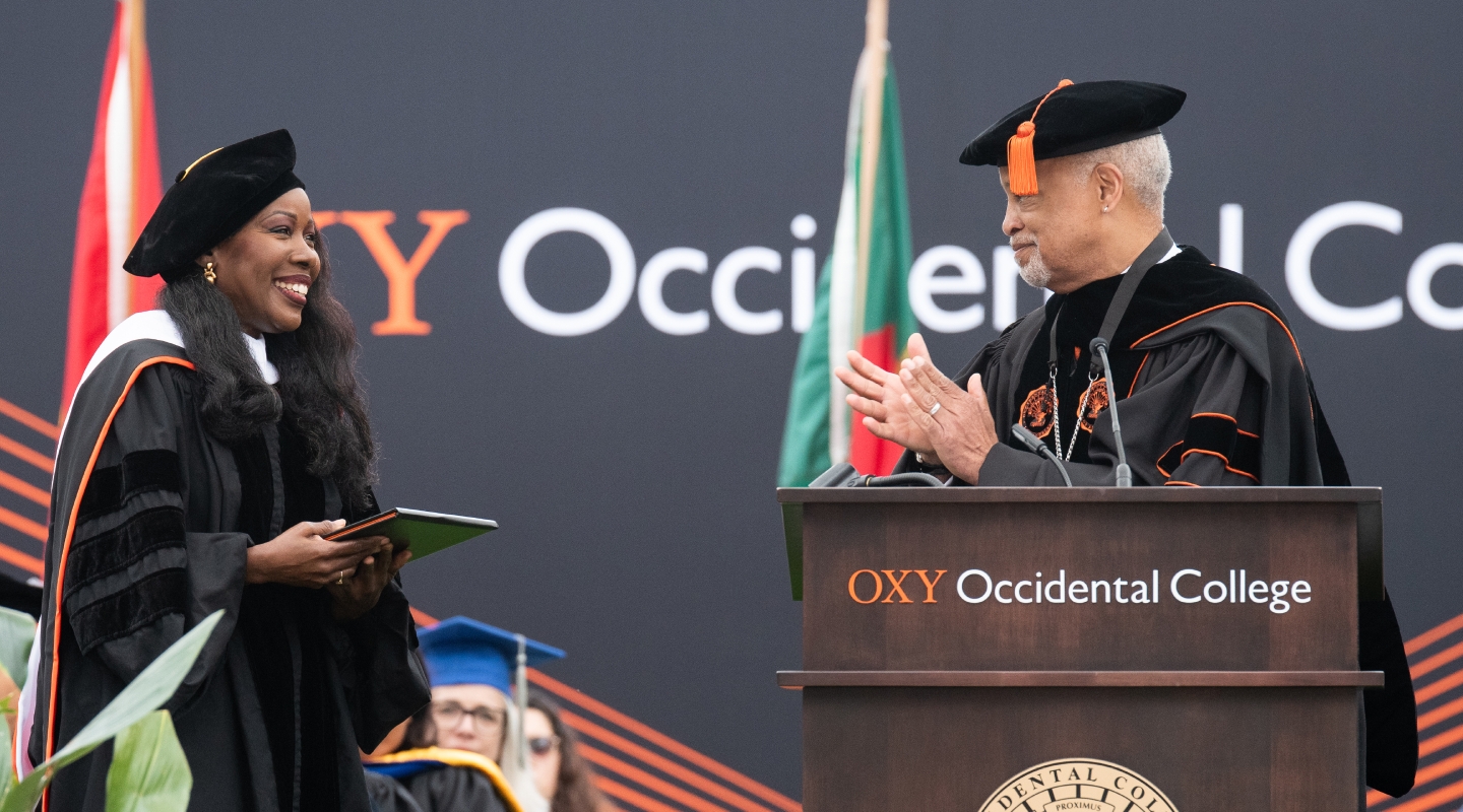 Author Isabel Wilkerson and President Elam