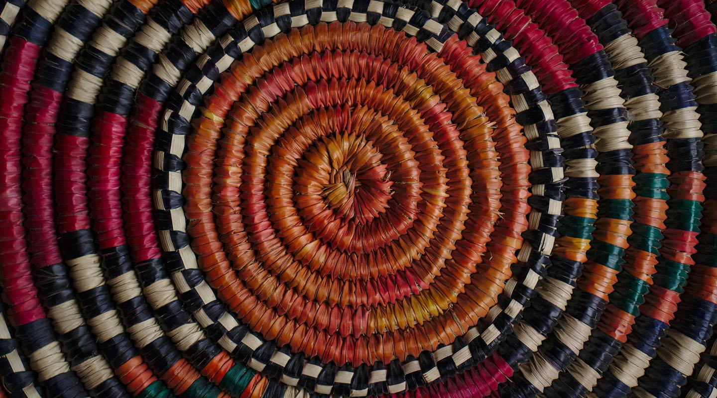 a colorful woven basket
