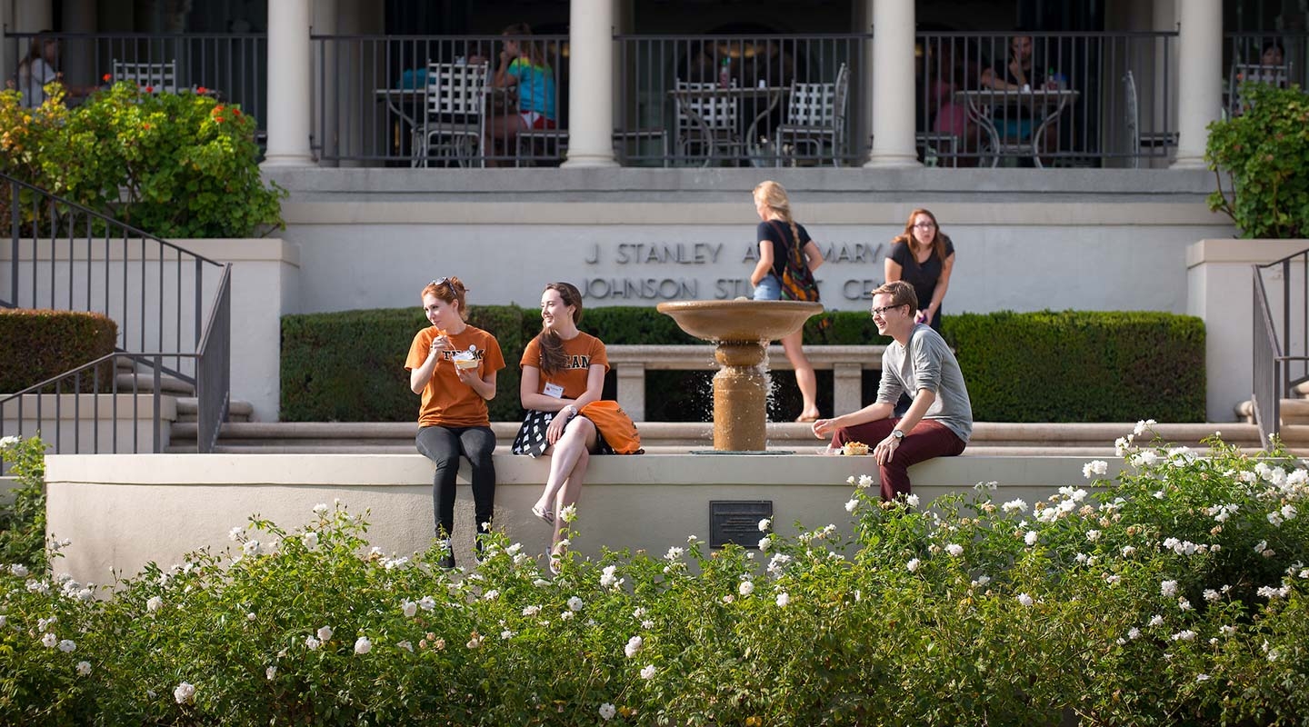 Students relax in front of Johnson Student Center