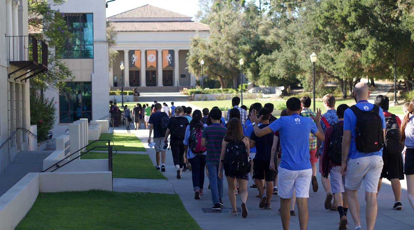 A group of students on campus for a summer program at Oxy