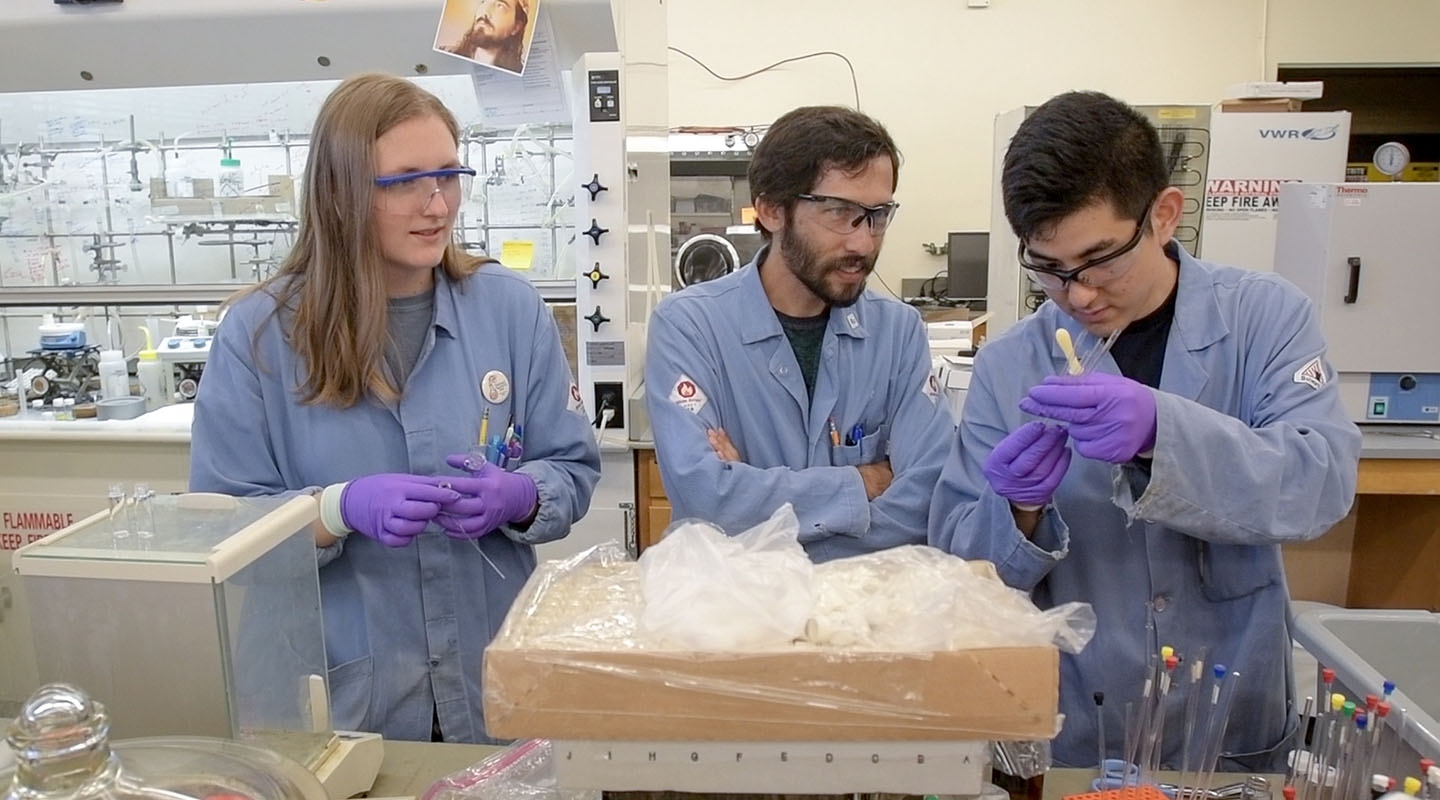 Prof. Jeffrey Cannon and students in the chemistry lab