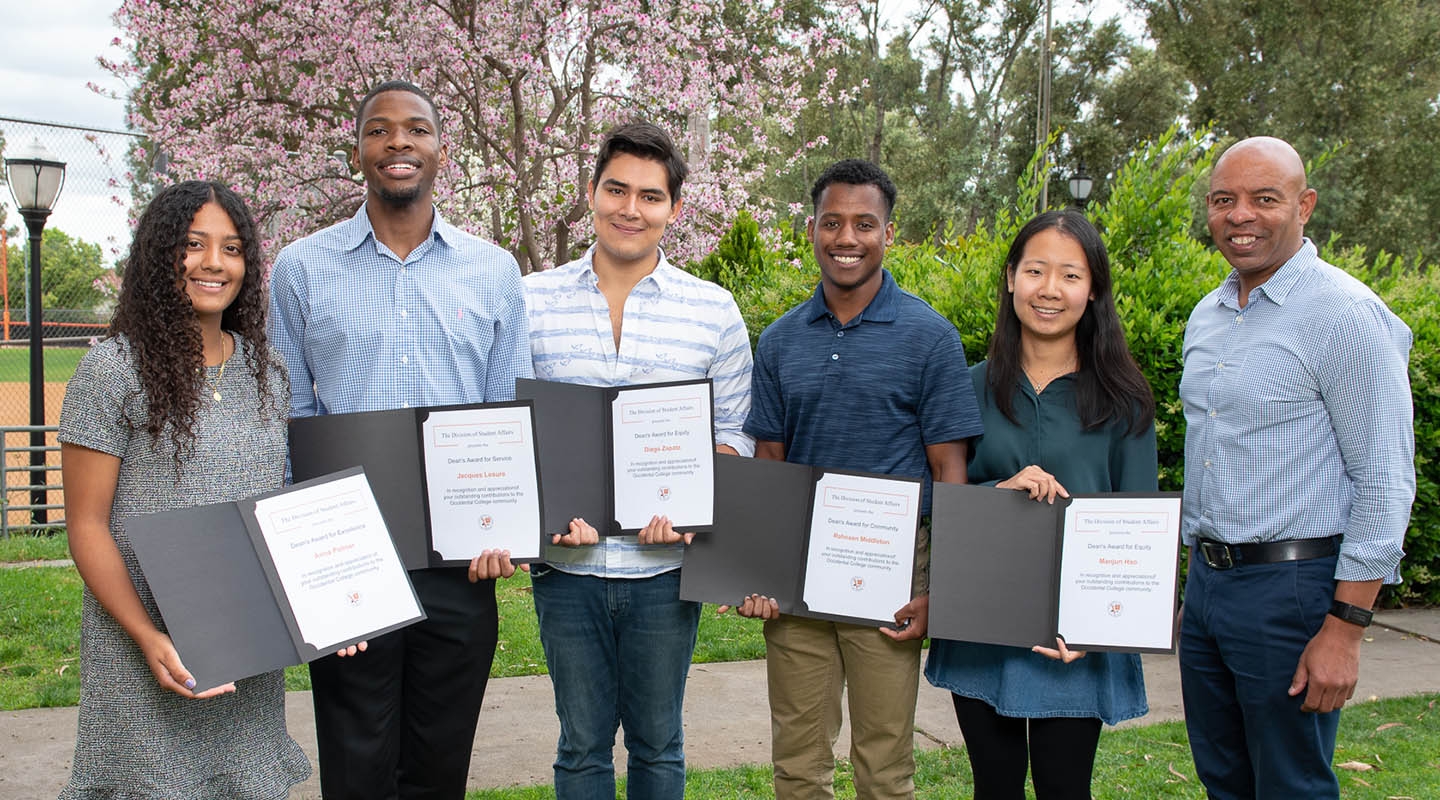 2019 Dean's Awards winners pose with dean Rob Flot