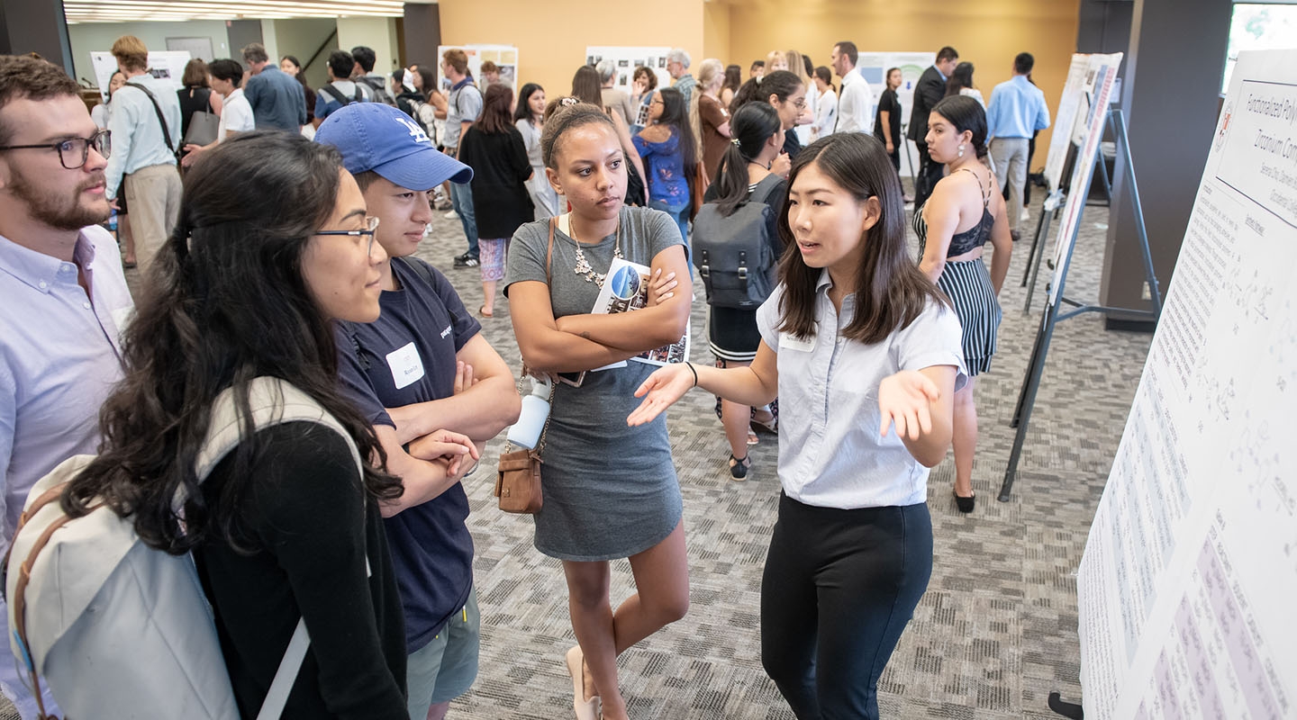 Student presenting at 2019 Summer Research Conference