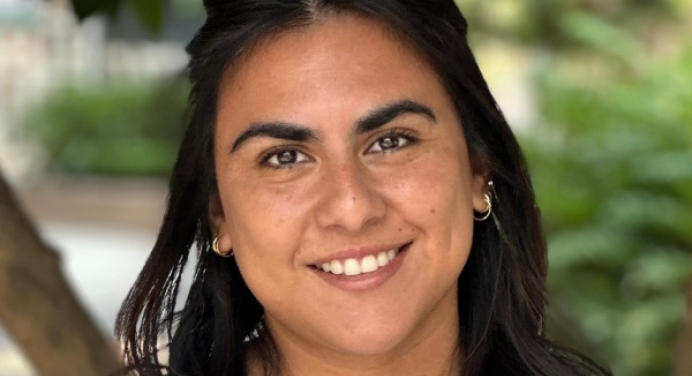 Woman in front of plants
