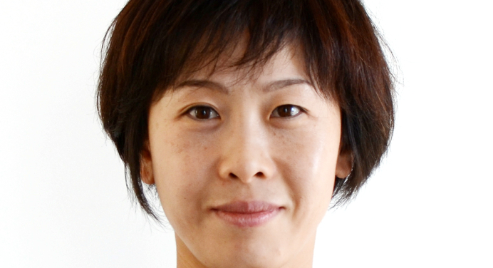 Woman in front of white background