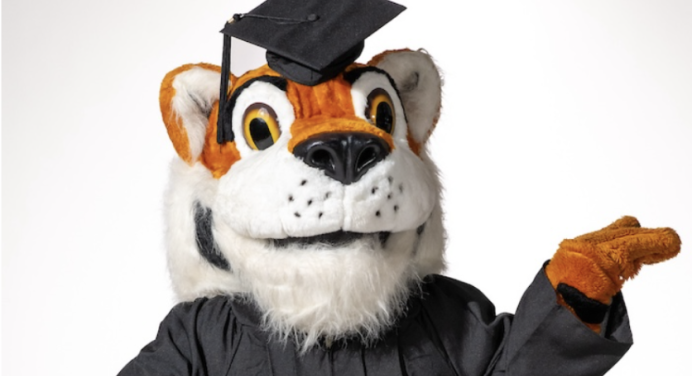Oswald in a cap and gown
